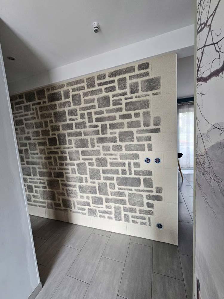 Mur après enduit décoratif