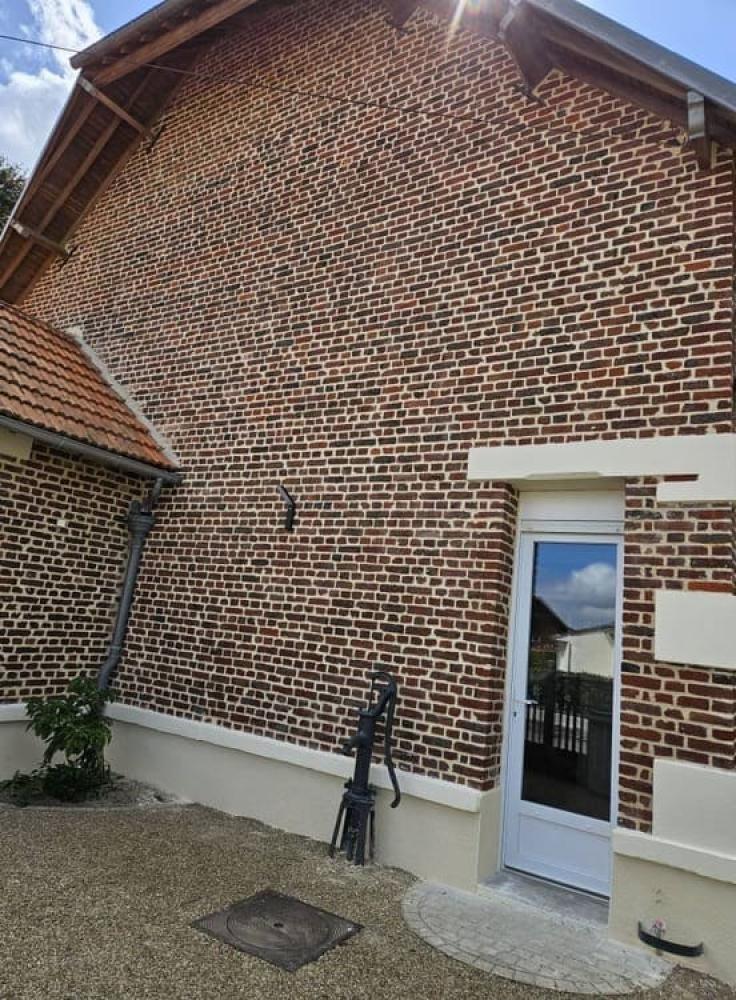 Finition grattée sur enduit extérieur